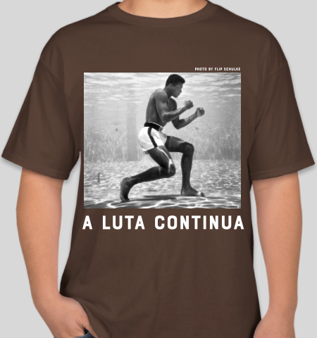 The Politicrat Daily Podcast A Luta Continua Series Muhammad Ali brown t-shirt
