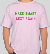 Load image into Gallery viewer, The Politicrat Daily Podcast Make Sexy Smart Again pale pink unisex t-shirt