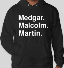 Load image into Gallery viewer, Medgar Malcolm Martin black unisex EcoSmart 50/50 Pullover Hoodie