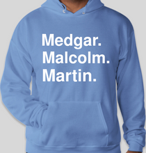 Load image into Gallery viewer, Medgar Malcolm Martin Carolina blue unisex EcoSmart 50/50 Pullover Hoodie
